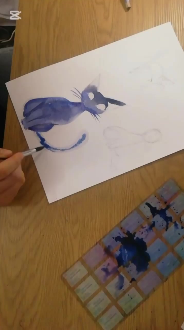 Close view of the watercolor cat being painted